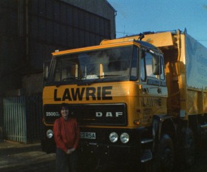 Marina beside a John Lawrie truck