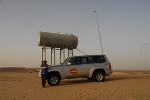 Marina with her LWB Patrol in the Liwa Desert