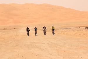 Four brave souls cycling in the Rub al Khali