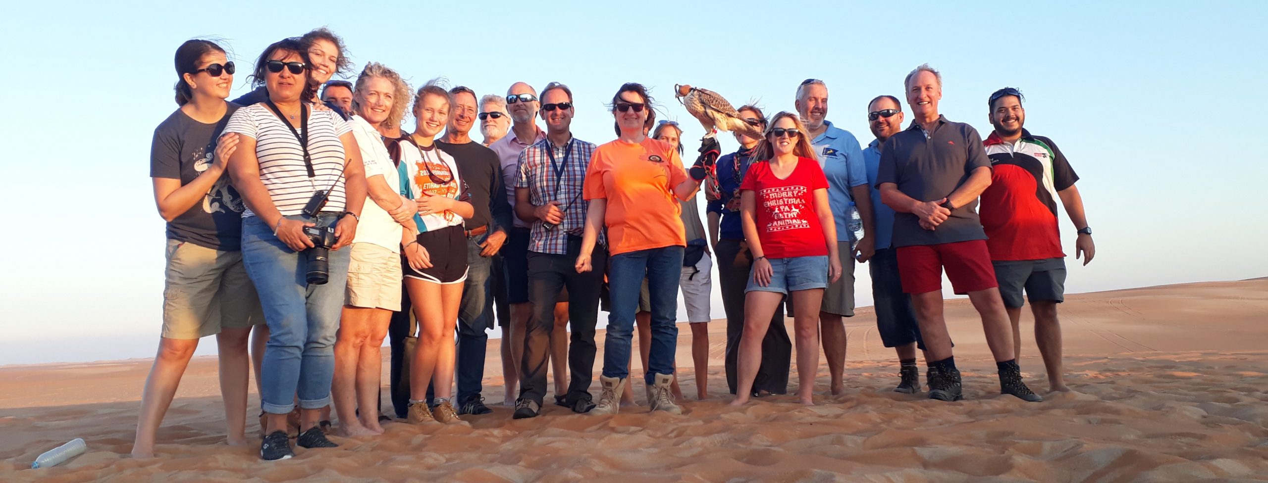The Desert Diva and friends stop for a photo with a local man's falcon