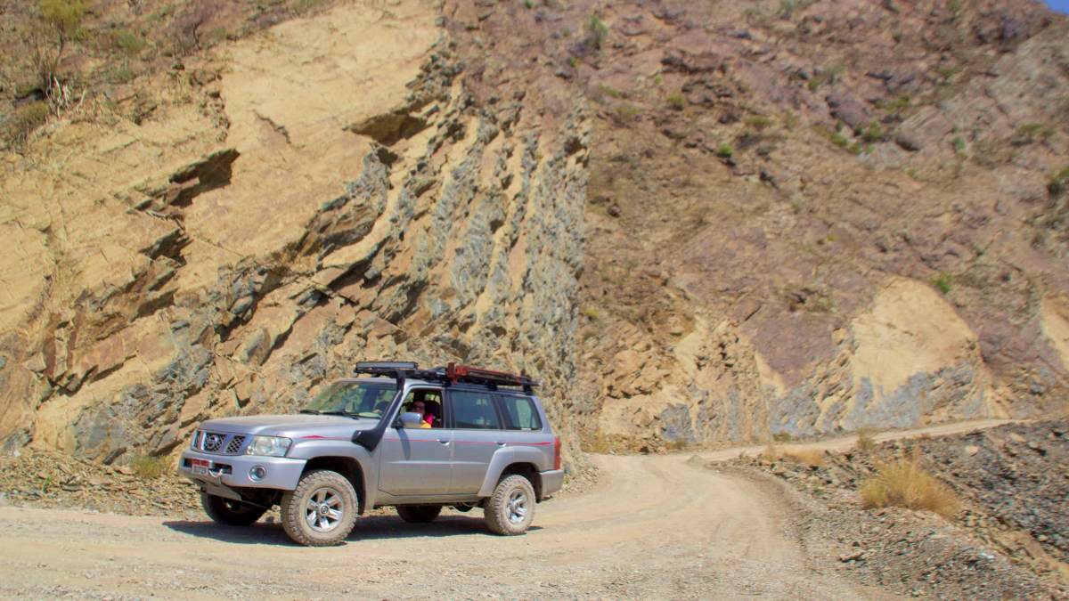 The Desert Diva stops for a picture on the mountain road to prove she's driven the route