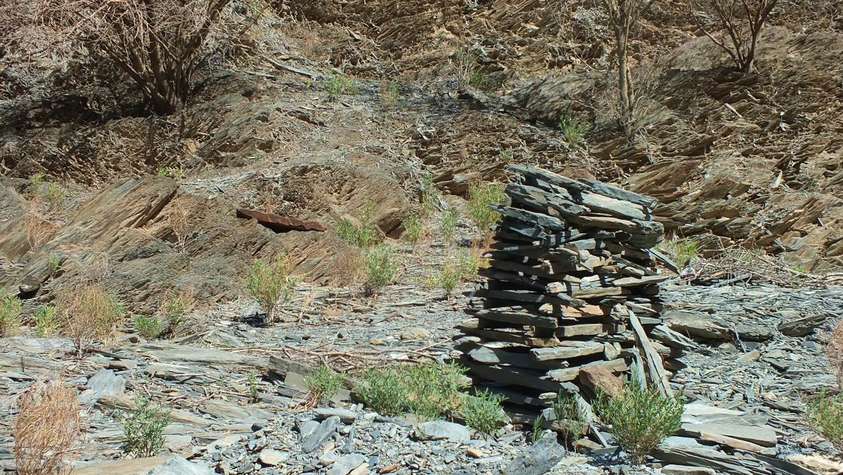 A collection of stones piled at the side of the wadi marking something unknown