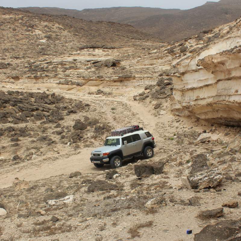 A Toyota FJ Cruiser on a track through the Dhofar mountains, Oman