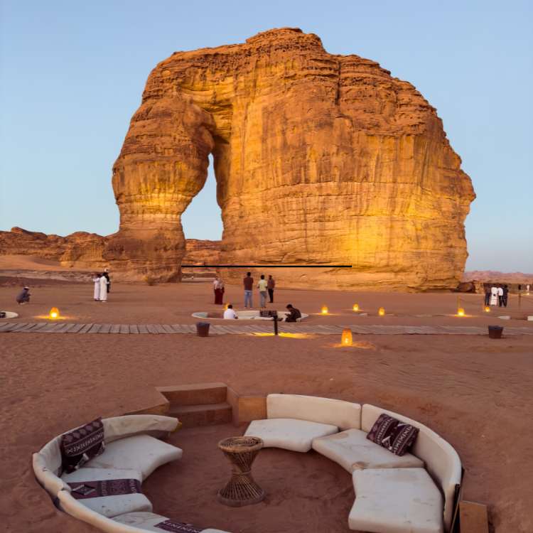 rock in the shape of an elephant, with seating areas in front